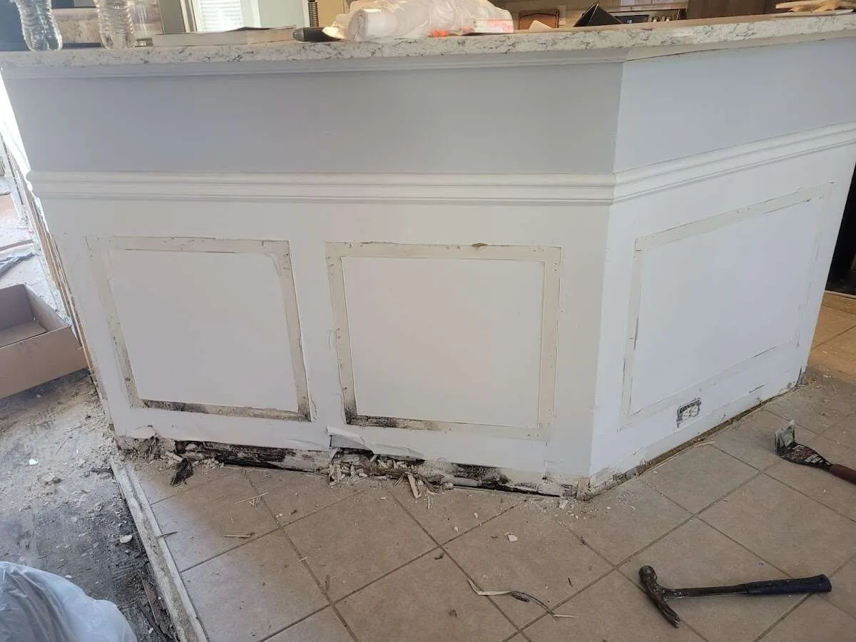 Water damage and mold on kitchen during Storm Damage Restoration in Wilton